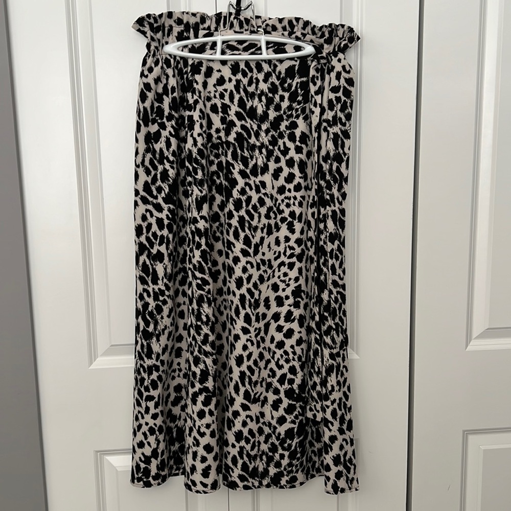 NWT long Skirt with tie detail. Size Large.Approx 35inch total length.
